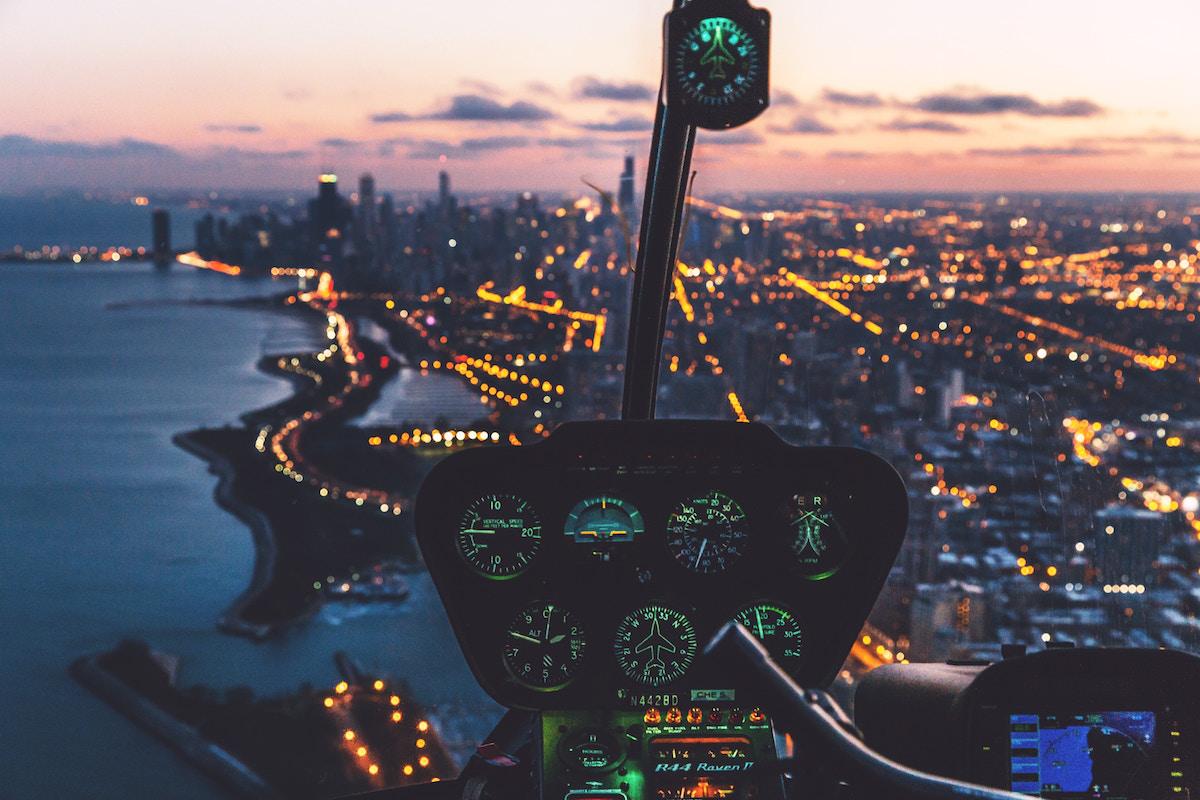 Cockpit with city lights in the background
